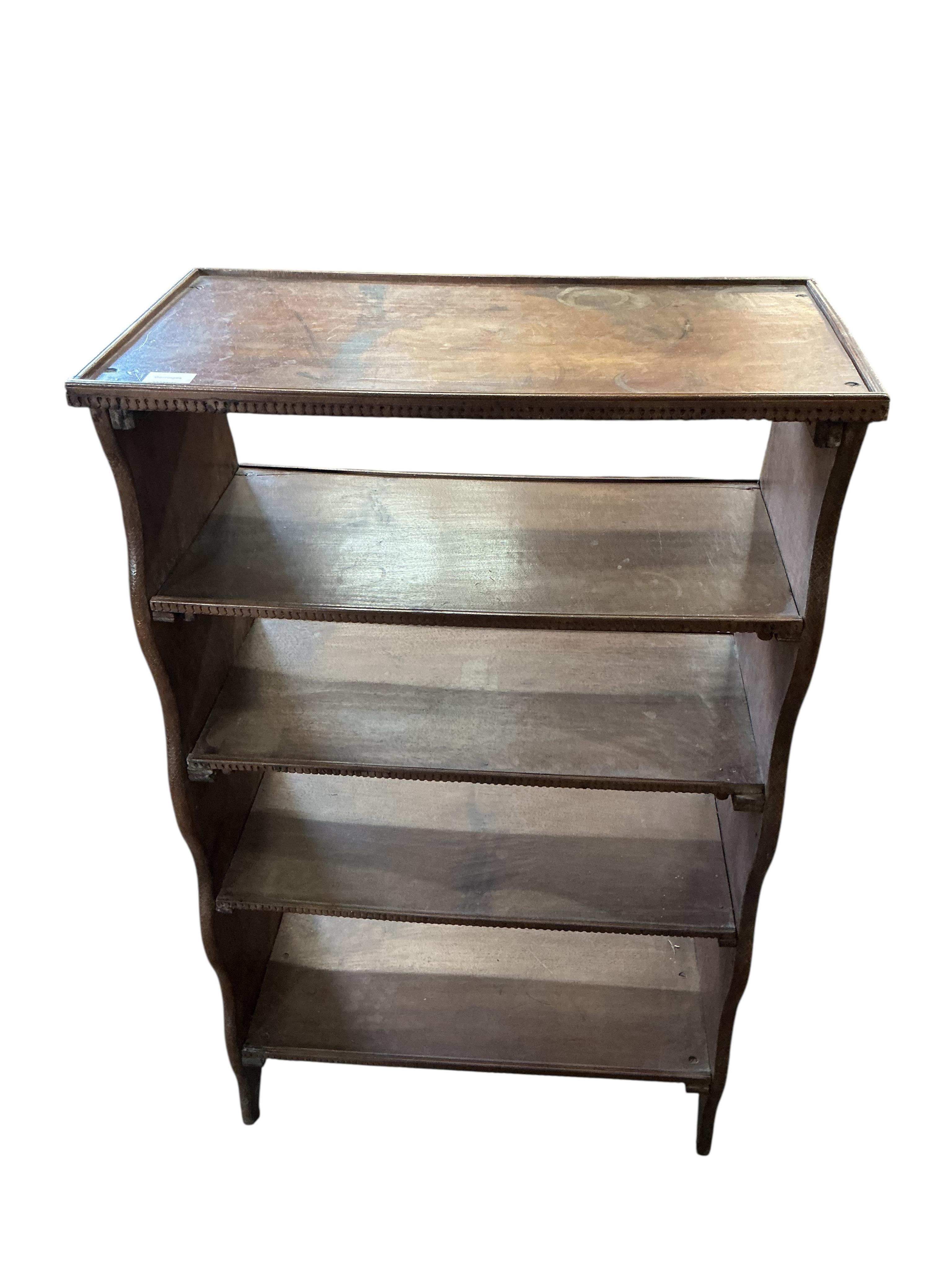 An Indian hardwood open bookcase, width 66cm, depth 34cm, height 107cm